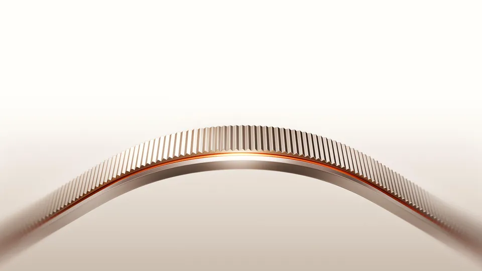 The knurled edge of the Find X10 Pro Max camera ring with an orange accent