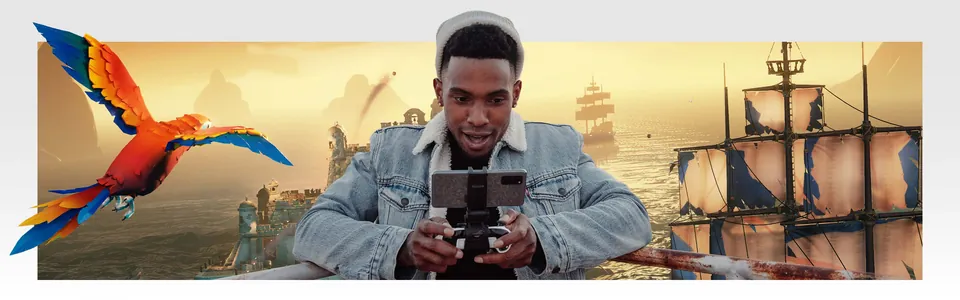 A player streaming Sea of Thieves on a phone clipped to a controller
