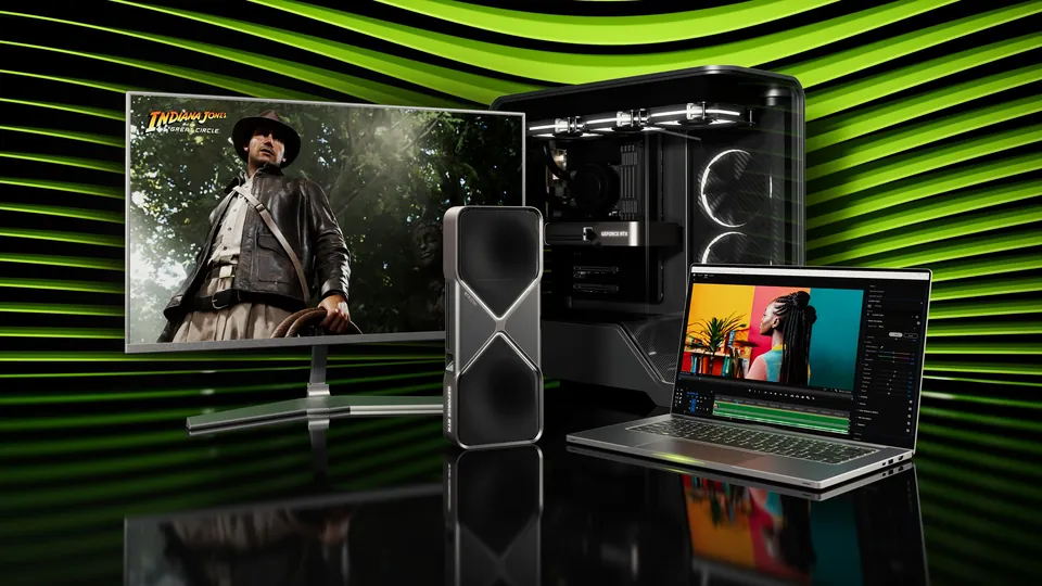 RTX 50 Series graphics card next to a gaming PC, a monitor and a laptop on a green and black stage