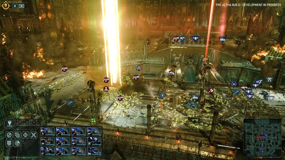 Orbital strike beams hit a burning city during a battle in Total War: Warhammer 40,000