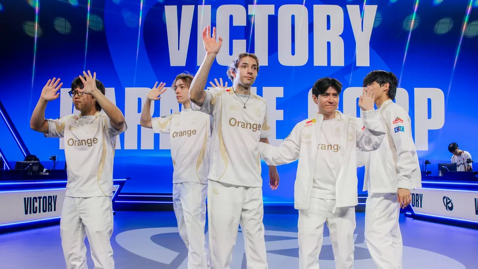 Karmine Corp players wave on stage under a Victory screen after winning the last Worlds 2026 Play-In series in Los Angeles