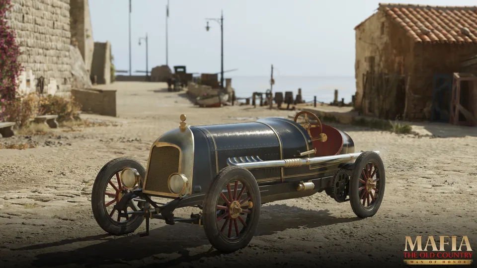 A pale blue vintage open-top car with brass headlights stands on a dusty road by a stone wall