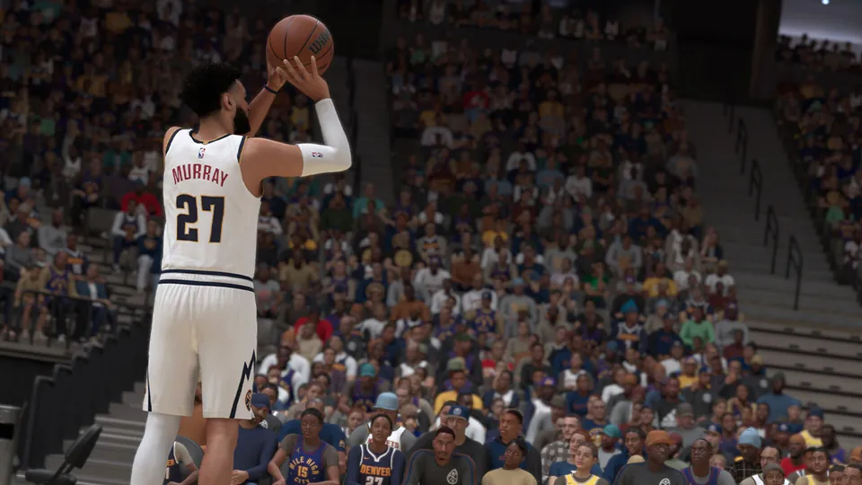 Jamal Murray of the Denver Nuggets takes a jump shot in a packed arena in NBA 2K25