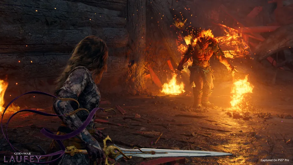 Faye faces a burning creature in a fiery ruin in God of War Laufey
