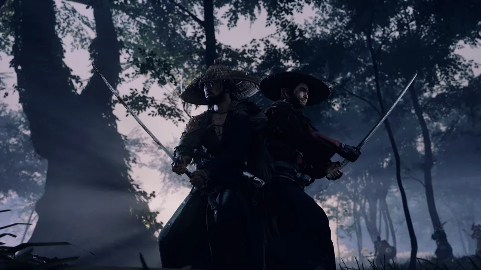 Two swordsmen in straw hats face off in a misty forest in Ghost of Tsushima