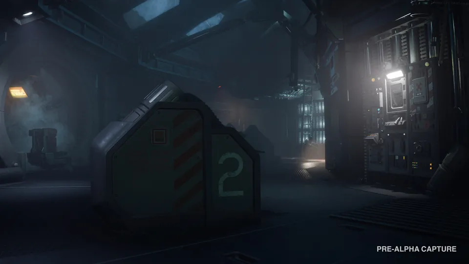 A dim station corridor with a marked storage container and machinery lit by a single lamp