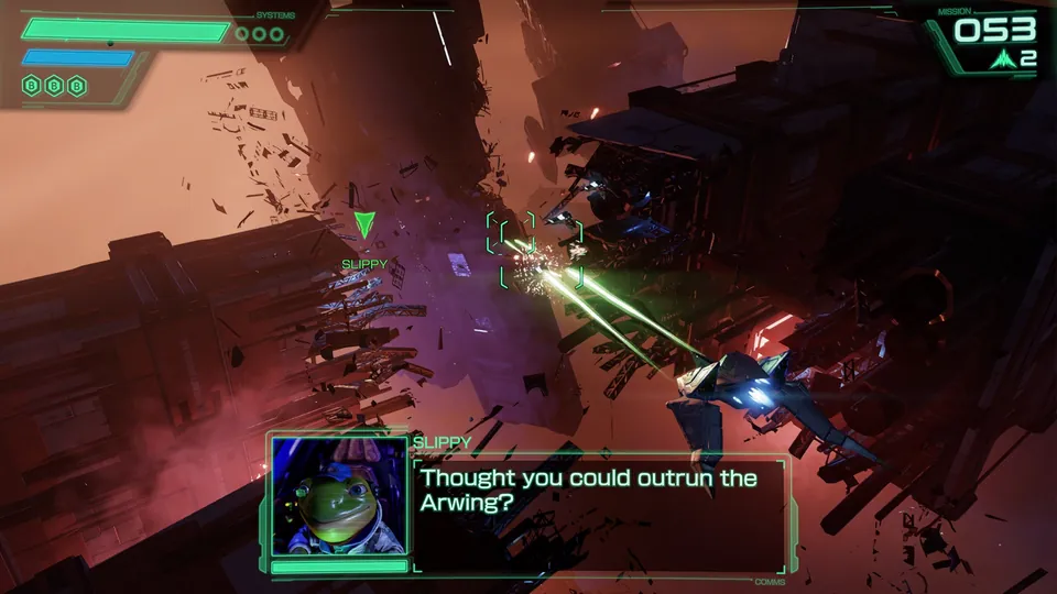 An Arwing fires lasers through a field of space debris as Slippy Toad calls out over the radio in Star Fox
