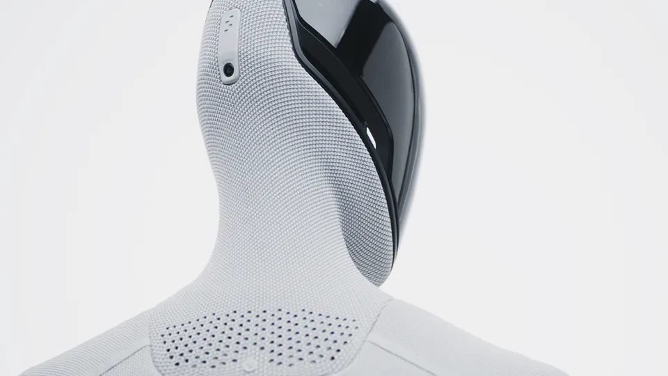 Close-up of Figure 03's black face visor and white knit head cover
