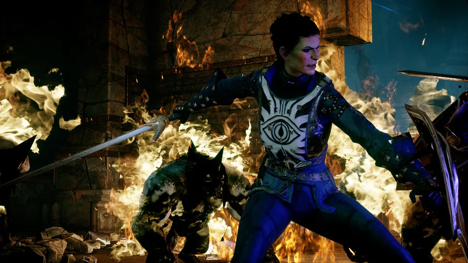 A warrior in blue armor swings a sword through flames and demons in Dragon Age: Inquisition