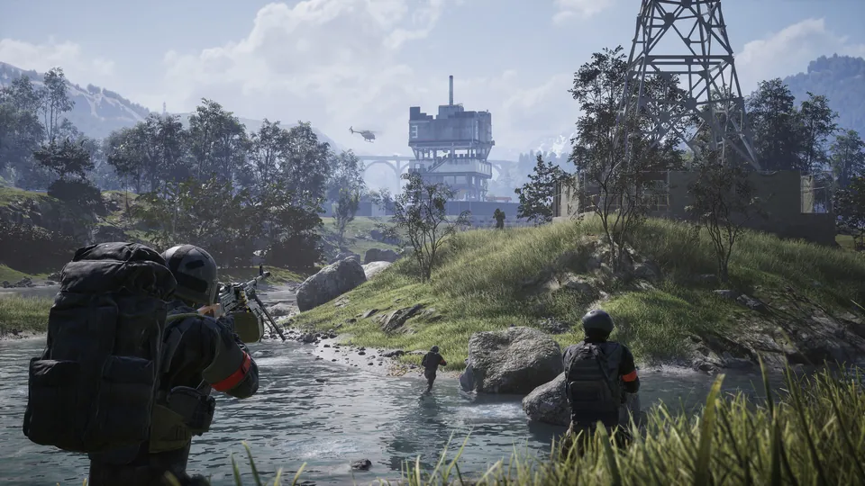 WARDOGS squad wading across a river toward a concrete tower and power pylon in the mountains