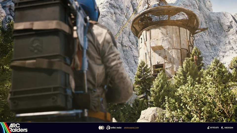A Raider with a large pack walks toward an outpost tower in a pine forest in ARC Raiders