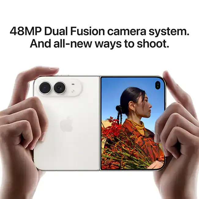 Two hands hold a star white iPhone Duo open, with the dual camera on one half and a portrait photo on the other