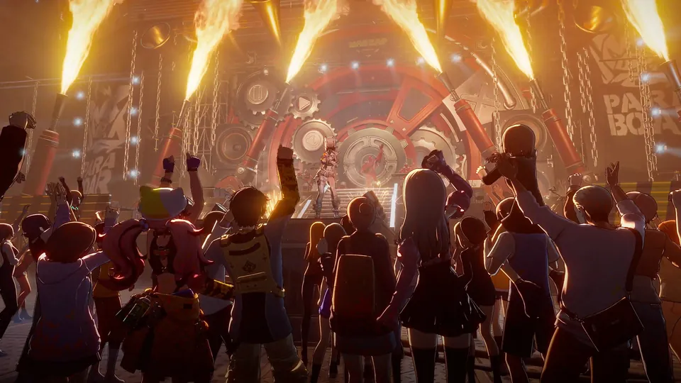 A crowd cheers at a concert stage with jets of fire in Ananta