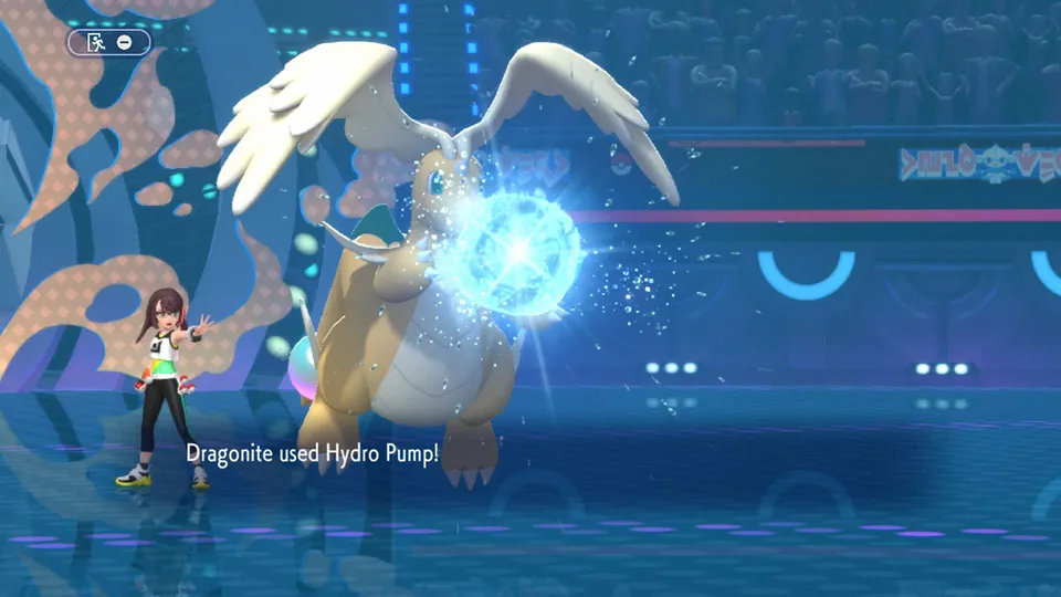 Dragonite uses Hydro Pump in a Pokémon Champions battle as a trainer watches from the side