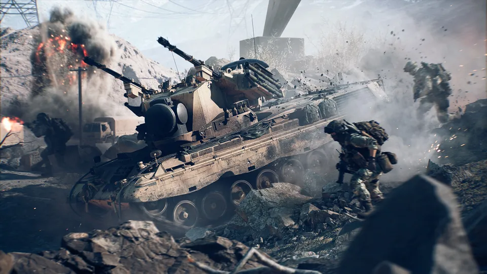 A tank fires through dust and debris while infantry move along a rocky ridge in Battlefield 6