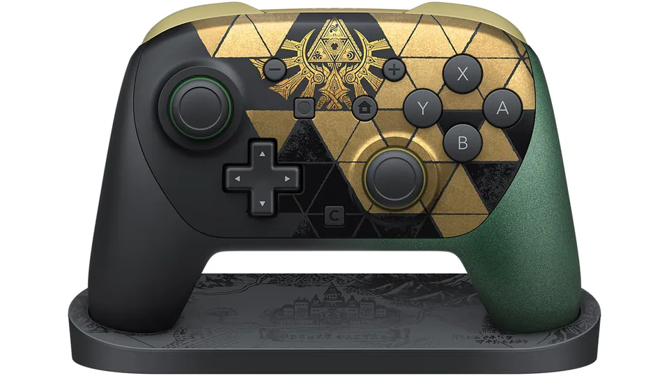 The black, gold and green Zelda 40th Anniversary Edition Pro Controller for Switch 2 standing on its dark gray display stand.