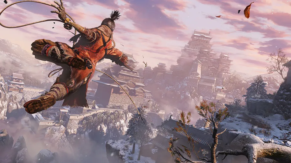 The shinobi swings on a grappling hook high above a snowy Japanese castle at sunset in Sekiro
