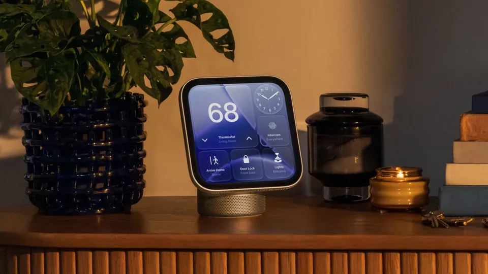 Apple HomeView on a living room sideboard, showing the temperature and home controls