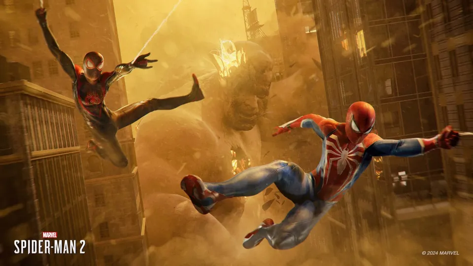 Peter Parker and Miles Morales leaping through a sand-filled street in Marvel's Spider-Man 2