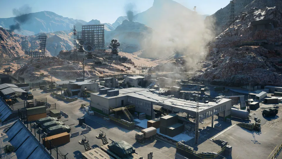 An aerial view of the Area 51 base and its hangars in the desert in Battlefield 6