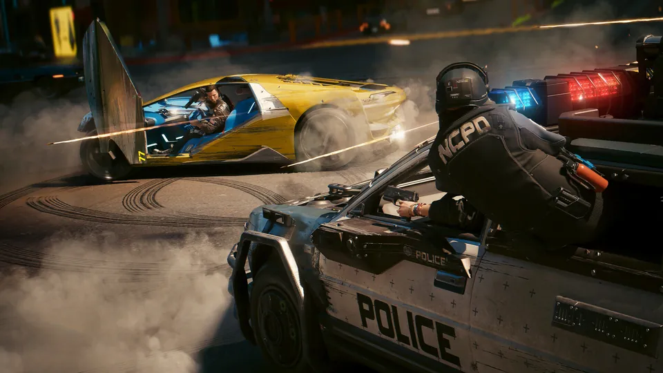 A police officer in heavy armor fires from a patrol car at a yellow sports car drifting through smoke in Cyberpunk 2077