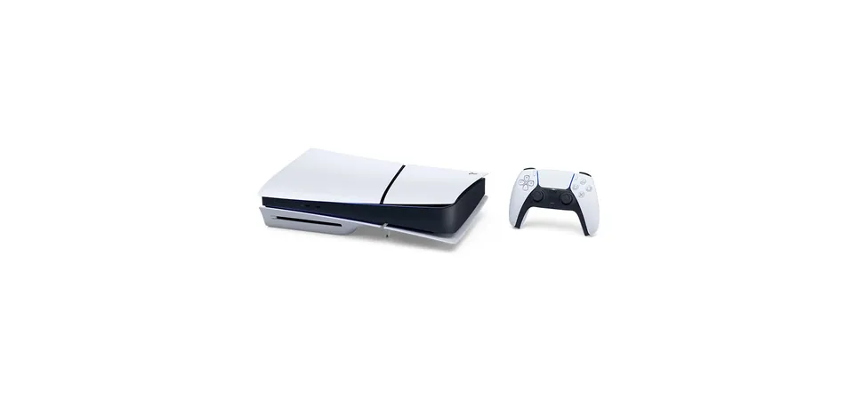 The PS5 with a disc drive lying flat next to a white DualSense controller
