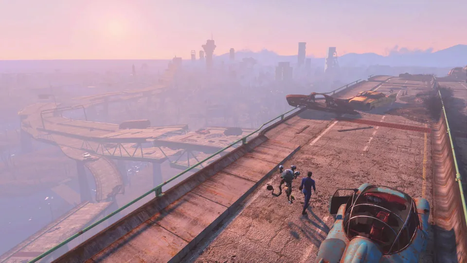 Two figures walk along a broken elevated highway above a hazy pink city skyline