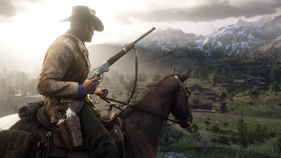 Arthur Morgan holds a rifle on horseback above a valley with snowy mountains in the distance in Red Dead Redemption 2