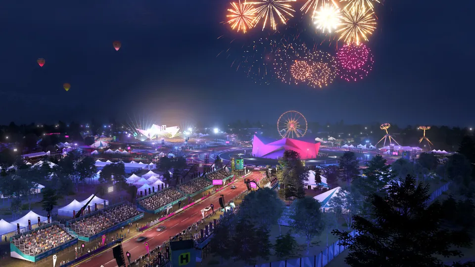 Fireworks over the Horizon festival grounds and a Ferris wheel at night