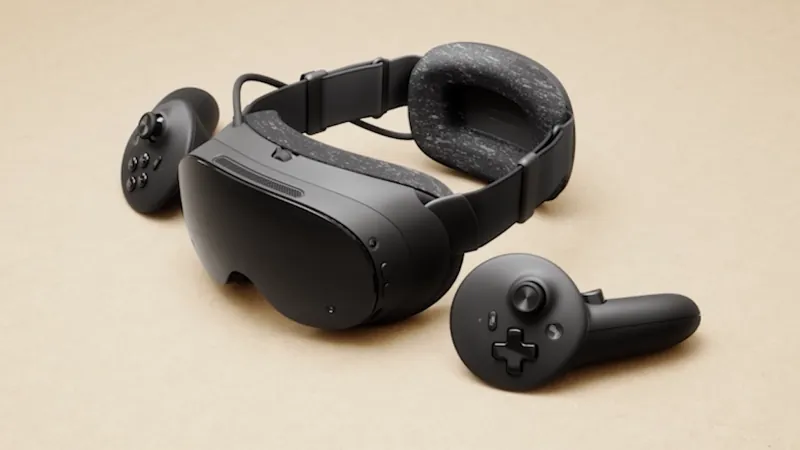 Steam Frame headset with its padded strap and two controllers