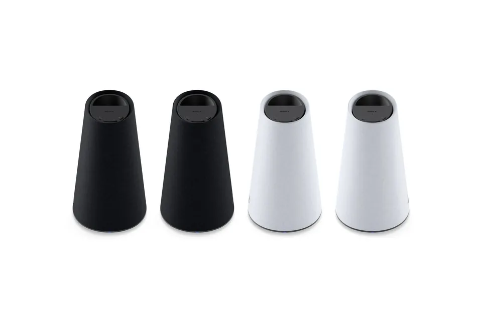 Four Pulse Elevate speakers seen from above, two black and two white, with the Sony logo and control buttons on each top panel