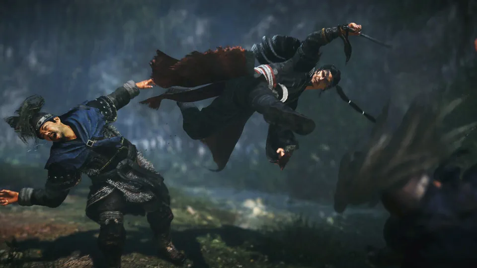 A warrior kicks an enemy soldier through the air on a misty battlefield in Wo Long 2