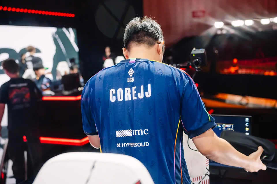 CoreJJ of Team Liquid Alienware, seen from behind in a jersey with the name on the back, on the MSI 2026 stage