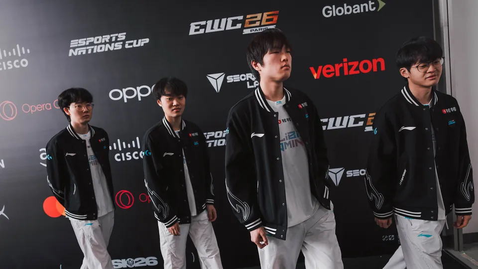 Four Bilibili Gaming players in team jackets walk past the media wall on day 4 of the MSI 2026 bracket stage in Daejeon, South Korea