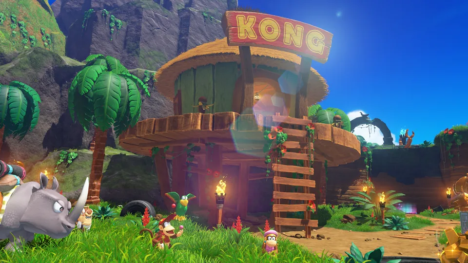 Rambi the rhino, Cranky Kong, Diddy Kong and Squawks gather below DK's Treehouse, topped with a Kong sign, on DK Island in Donkey Kong Bananza