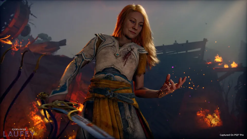 Faye holding a sword among flames and embers