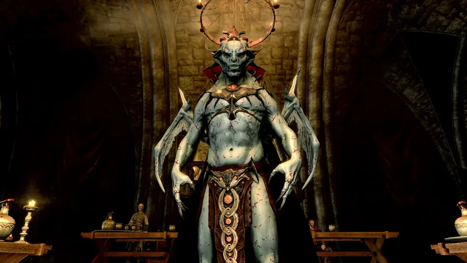 A pale, winged vampire lord with a spiked crown stands in a candlelit hall in Skyrim Anniversary Edition on Nintendo Switch 2