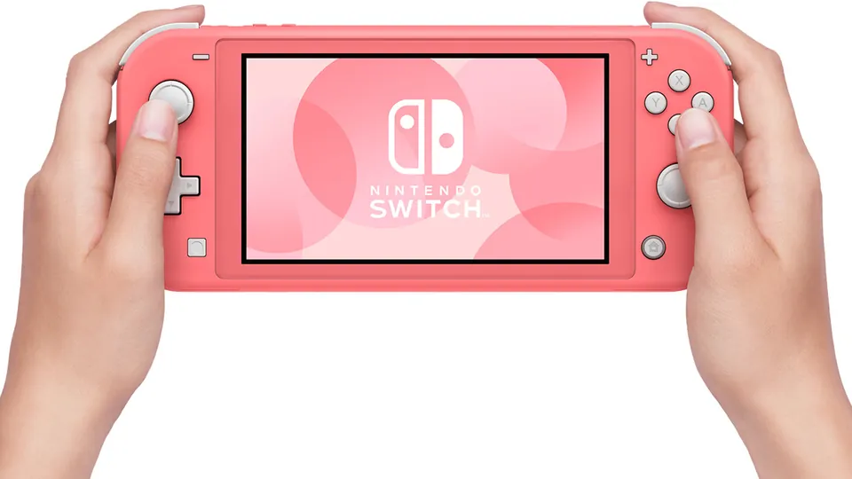 A coral Nintendo Switch Lite held in two hands