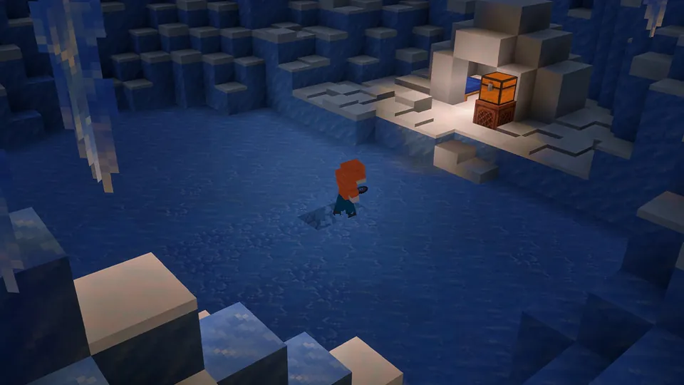 A player crosses brittle ice in an ice cave toward a chest stacked on a jukebox in Minecraft