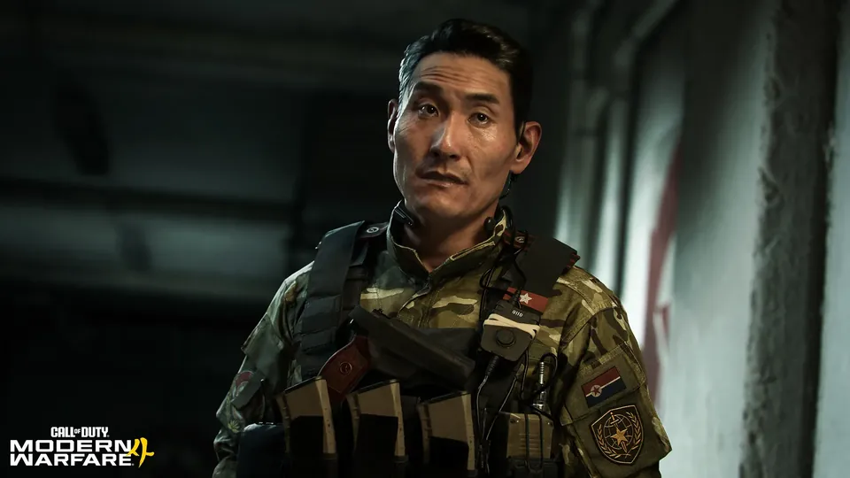 An officer in camouflage stands in a dim corridor in Call of Duty: Modern Warfare 4