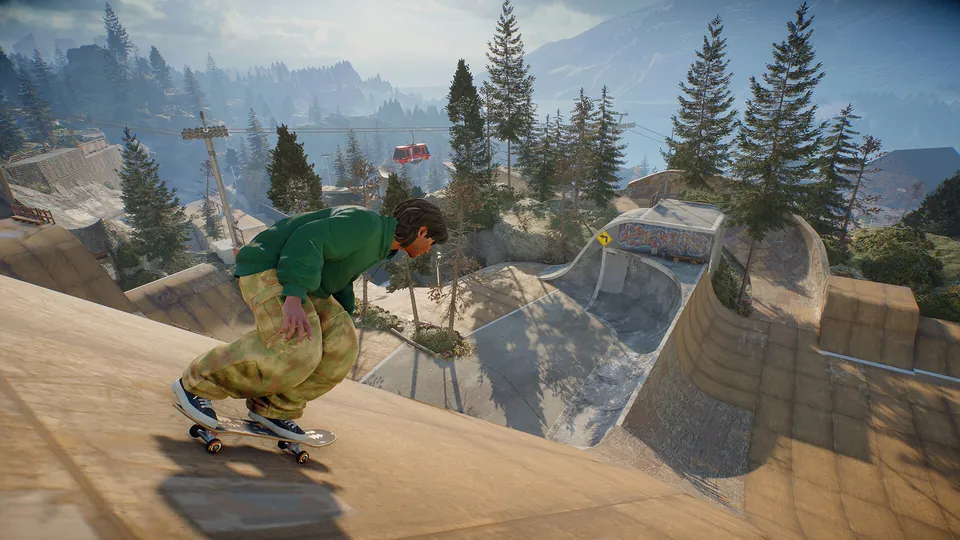 A skater rolls down a wooden ramp above a park of bowls and pine trees in the mountains in skate.