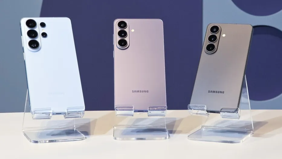 Three Galaxy S26 phones on clear stands