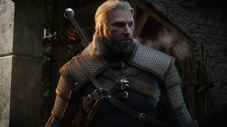 Geralt of Rivia, with white hair, a scarred face and chain mail armor, stands by a stone house in The Witcher 3.