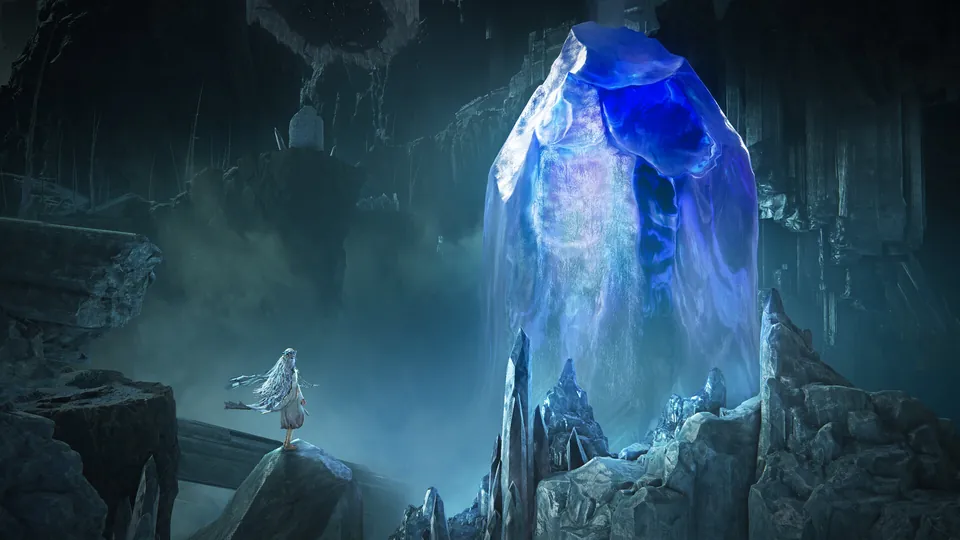 A lone figure stands on a cliff before a huge glowing blue crystal in a vast cavern