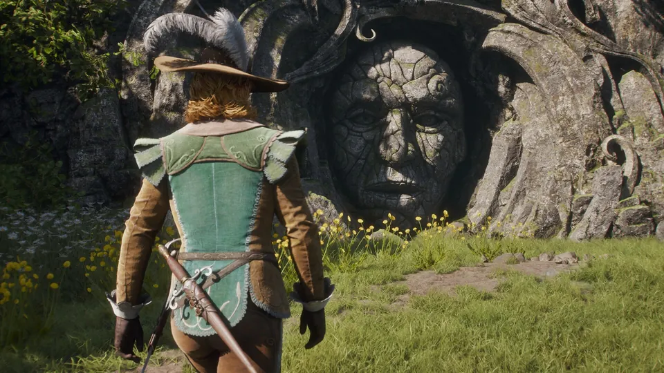 A Fable hero in a green coat stands before a huge stone face carved into a cliff