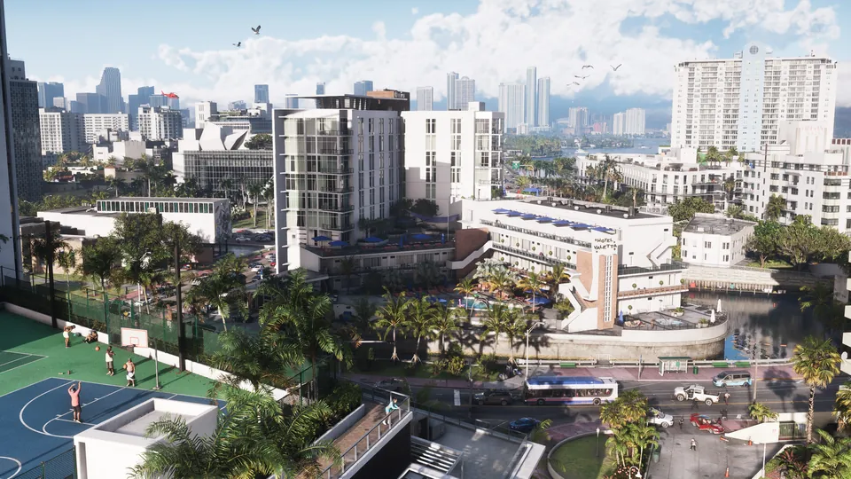 Daytime view over Vice City streets, a basketball court and apartment blocks