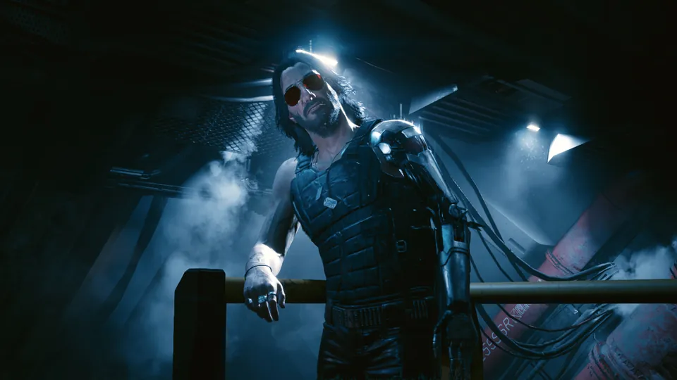 Johnny Silverhand in aviator sunglasses and a chrome arm leans on a railing in a smoky blue corridor in Cyberpunk 2077 on Nintendo Switch 2