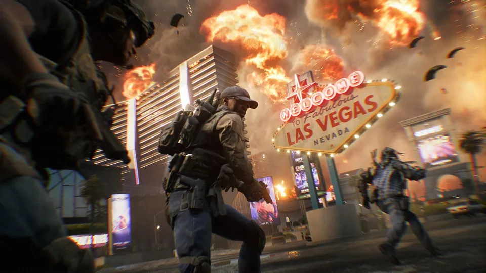 Soldiers fight through explosions in front of the Welcome to Fabulous Las Vegas sign on the Vegas Strip map in Battlefield 6 Season 5