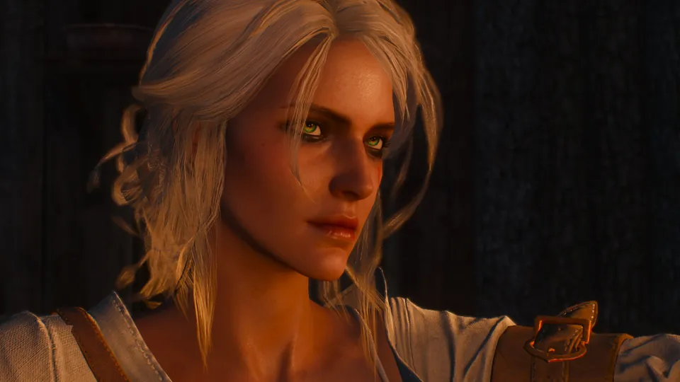 Ciri, with ash blond hair and a scar near one eye, looks to the side in a dim room