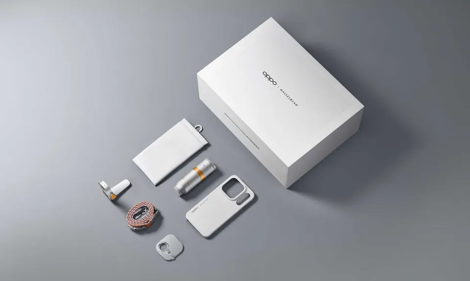 Oppo's Hasselblad Teleconverter Kit laid out next to a Find X10 Pro Max and its box